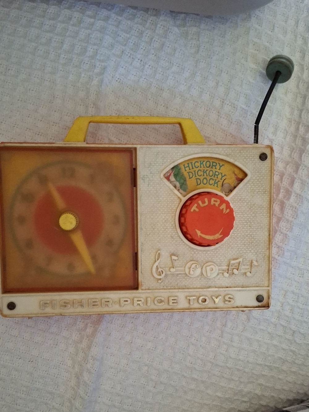 Fisher-Price Vintage Music Toy with Yellow Handle and Red Dial